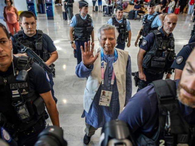 nobel peace prize winner muhammad yunus c at paris main airport before flying back to flying back to bangladesh to lead a caretaker government photo afp